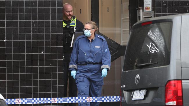 Police at the scene of a fatal stabbing in Melbourne’s west. Picture: David Crosling