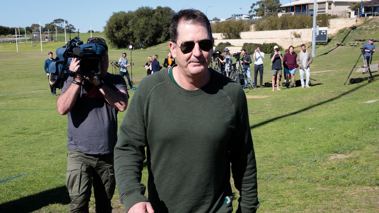 Former Fremantle Dockers head coach Ross Lyon leaves after a press conference in Perth, Tuesday, August 20, 2019. (AAP Image/Richard Wainwright) NO ARCHIVING