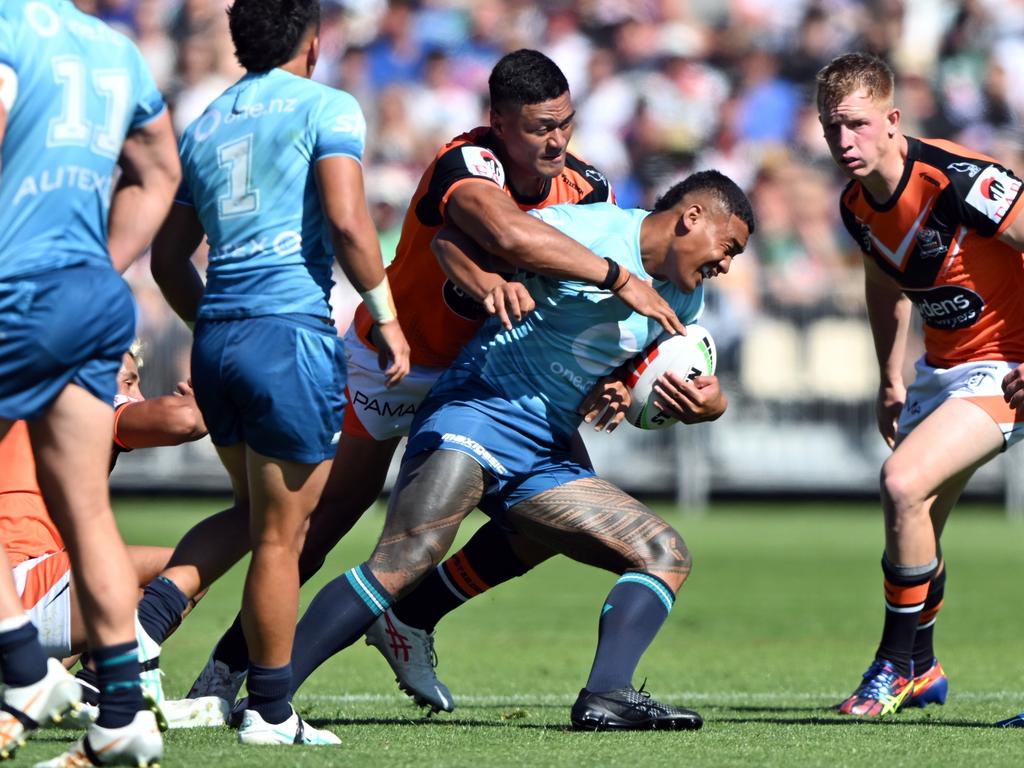 Zyon Maiu'u of the Warriors is tackled during pre-season. Picture: Kai Schwoerer/Getty Images