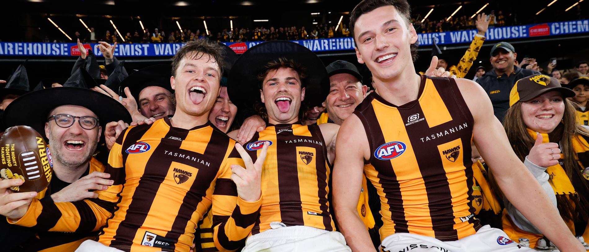 MELBOURNE, AUSTRALIA - SEPTEMBER 06: Jack Ginnivan, Nick Watson and Connor Macdonald of the Hawks pose for a photo during the 2024 AFL Second Elimination Final match between the Western Bulldogs and the Hawthorn Hawks at The Melbourne Cricket Ground on September 06, 2024 in Melbourne, Australia. (Photo by Dylan Burns/AFL Photos via Getty Images)