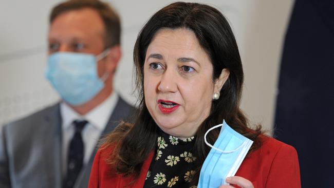 Premier Annastacia Palaszczuk talks to the media about wearing a mask at a press conference about COVID in Brisbane. Picture: John Gass