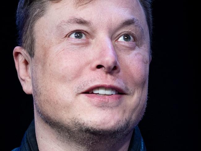 (FILES) In this file photo Elon Musk, founder of SpaceX, speaks during the Satellite 2020 at the Washington Convention Center on March 9, 2020, in Washington, DC. - Tesla began officially accepting bitcoin as currency to purchase electric autos, Chief Executive Elon Musk said on March 24, 2021 a with bitcoin,
