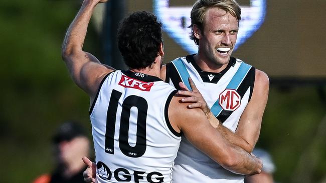 MT BARKER, AUSTRALIA - FEBRUARY 21: Jack Lukosius of the Power celebrates a goal with Travis Boak of the Power during the AFL practice match between Adelaide Crows and Port Adelaide Power at Mt Barker Summit Sport and Recreation Ground on February 21, 2025 in Mt Barker, Australia. (Photo by Mark Brake/Getty Images)