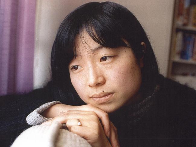 Lucy Wang pictured at home in the days after John Newman’s murder in September 1994.