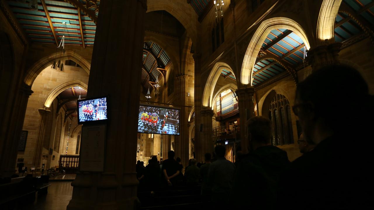 Sydney, Australia: Members of the public view the televised funeral of Queen Elizabeth II at St. Andrew‘s Cathedral in the CBD. Picture: Getty Images