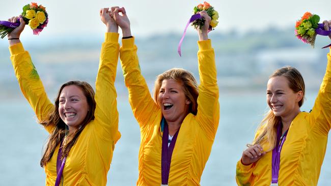 Australian girls Olivia Price, Nina Curtis and Lucinda Whitty receive their silver medals at the 2012 London Olympic Games.