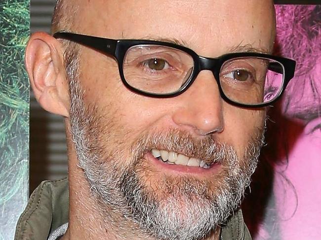 (FILES) This file photo taken on June 13, 2016 shows musician Moby attending "Eat That Question:Frank Zappa in His Own Words" Premiere in Hollywood, California. Moby said January 10, 2017 he is ready to DJ in Washington for Donald Trump's inauguration -- if the incoming president releases his tax returns. The electronic artist said a booking agent sounded him out about spinning for one of the inaugural balls -- a highly unusual request considering Moby's well-known leftist politics. But Moby, a supporter of Trump's rival Hillary Clinton and outspoken animal rights activist, sensed an opportunity.  / AFP PHOTO / JEAN BAPTISTE LACROIX