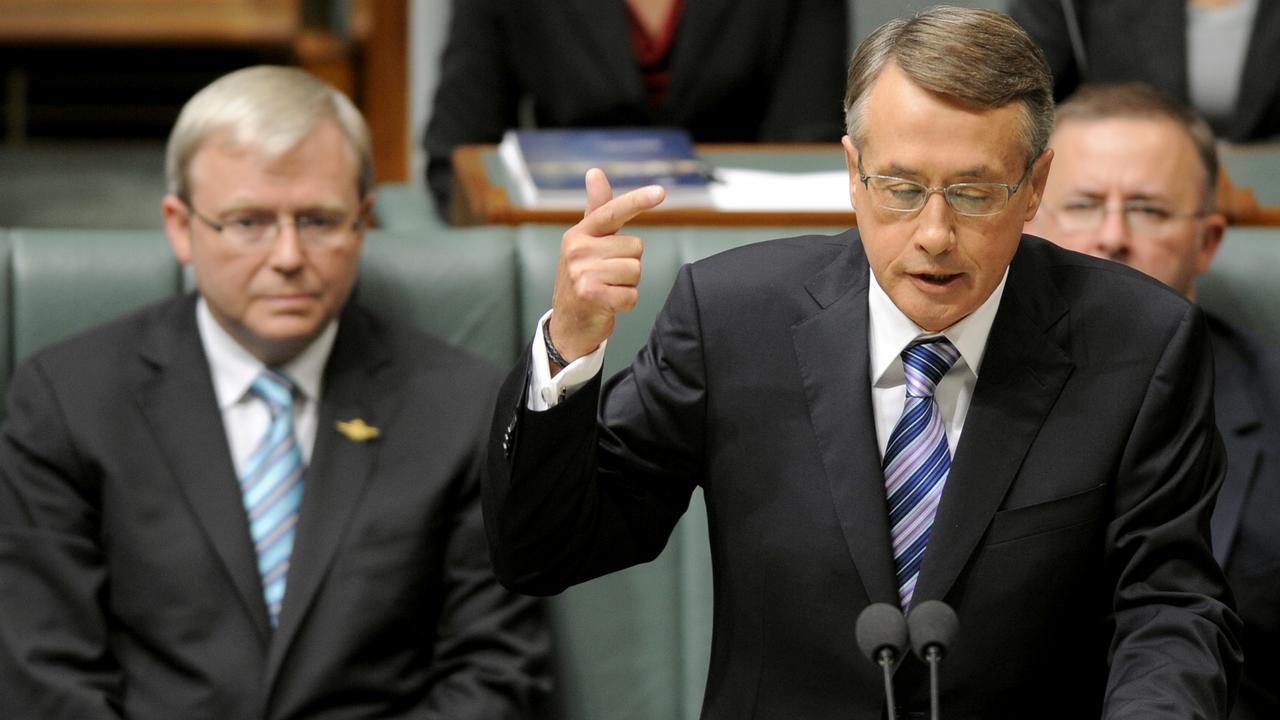 Flashback: then-Treasurer Wayne Swan handing down his first budget in Canberra, and the last surplus to be announced on May 13, 2008. (AAP Image/Alan Porritt)