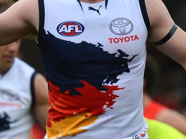 Crows player Tom Lynch reacts after kicking a goal  during the Round 14 AFL match between the Gold Coast Suns and the Adelaide Crows at Metricon Stadium on the Gold Coast, Saturday, June 29, 2013. (AAP Image/Dave Hunt) NO ARCHIVING, EDITORIAL USE ONLY