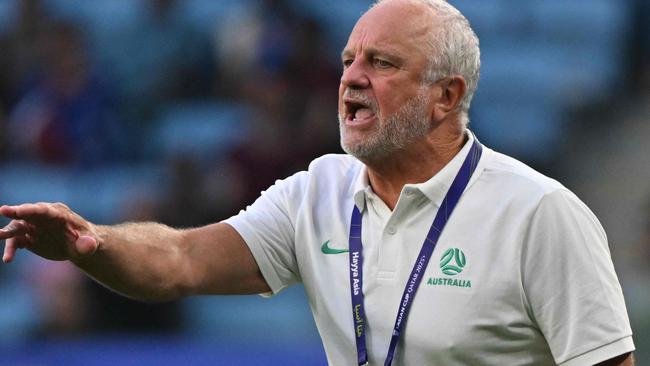 (FILES) Australia's coach Graham Arnold reacts during the Qatar 2023 AFC Asian Cup Group B football match between Australia and Uzbekistan at the Al-Janoub Stadium in Al-Wakrah, south of Doha on January 23, 2024. Graham Arnold has quit as coach of the Socceroos, Football Australia said on September 20, 2024, following a poor start to the third round of qualifying for the 2026 World Cup. (Photo by HECTOR RETAMAL / AFP)