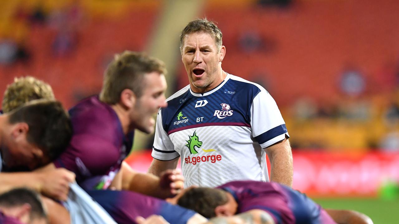 Wallaby Izack Rodda left the Reds in large part because of coach Brad Thorn (centre). Photo: AAP