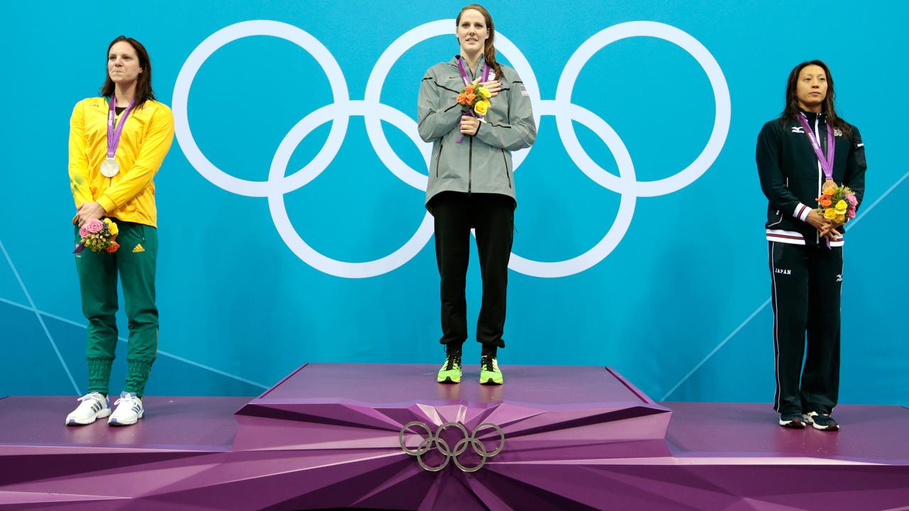 Australian swimmer Emily Seebohm stands in the silver medal position on the podium at the London Olympics in 2012. Missy Franklin, of the US, receives gold and Japan’s Aya Terakawa receives bronze for the 100m backstroke. Picture: Getty Images