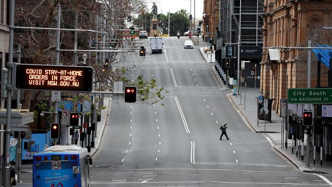 Empty streets and buildings closed in the city in Sydney. Picture: Toby Zerna