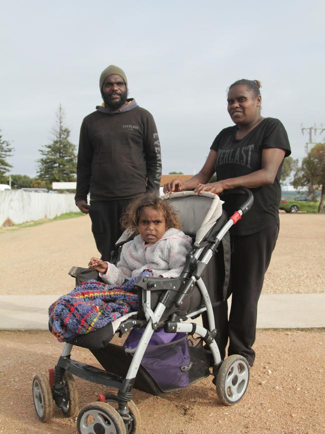 Ceduna residents Samantha Woods with daughter Janet, 3, and partner Kingsbery Nelson. Picture: Andrew Brooks