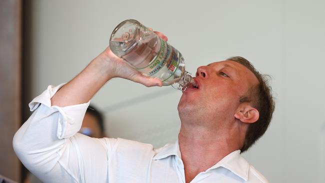 Steven Miles chugging back some water from the Great Artesian Basin. Picture: NewsWire / David Clark