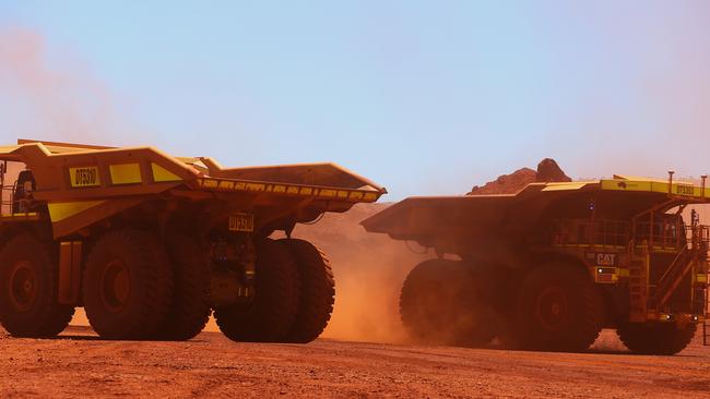 Iron ore trucks at Fortescue’s mining operations in Pilbara, WA. Picture /Bloomberg