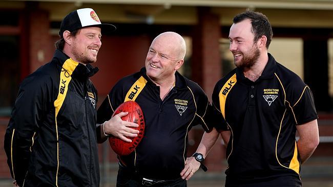 Brighton Football Club president Kym Steer (centre) with assistant coach Joel Tucker and A-grade player Miles Sumner. Picture: Dylan Coker