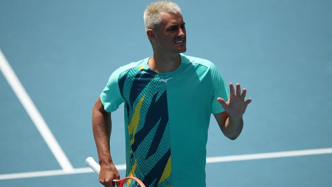 MELBOURNE, AUSTRALIA – JANUARY 11: Bernard Tomic of Australia looks on in his match against Roman Safiullin of Russia during day two of 2022 Australian Open Qualifying at Melbourne Park on January 11, 2022 in Melbourne, Australia. (Photo by Graham Denholm/Getty Images)