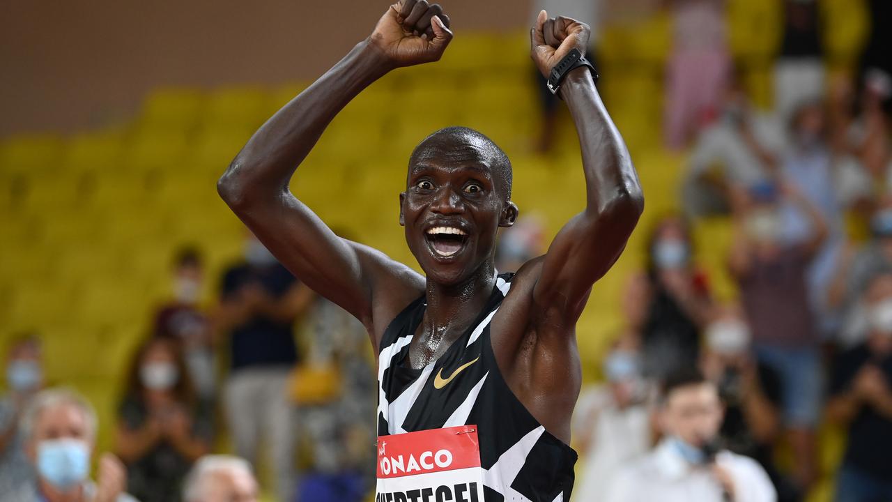 Joshua Cheptegei of Uganda celebrates.