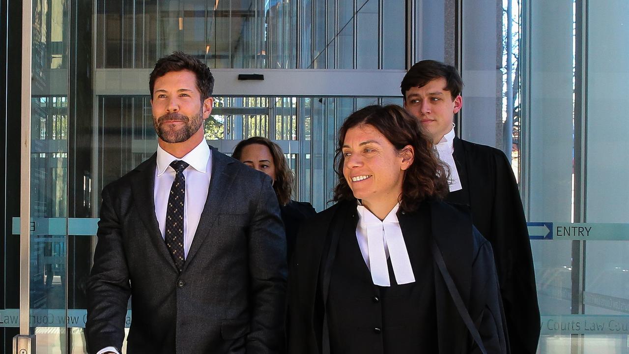 Former Commando Heston Russell is seen leaving the Federal Court in Sydney with his legal team. Picture: NCA Newswire /Gaye Gerard