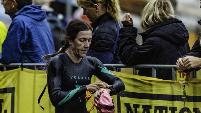 Athletes return from the swimming leg of the Ironman 70.3 Tasmania in Hobart on Sunday 4th February. Picture: Linda Higginson