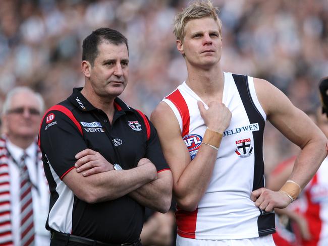 Lyon with St Kilda captain Nick Riewoldt after the 2010 Grand Final replay.