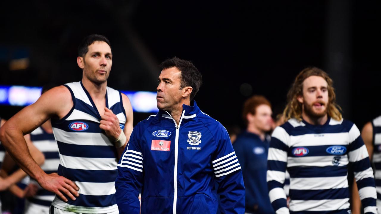 ADELAIDE, AUSTRALIA — JUNE 22: (L-R) Harry Taylor of the Cats, Cats head coach Chris Scott and Cameron Guthrie of the Cats look on during the round 14 AFL match between the Port Adelaide Power and the Geelong Cats at Adelaide Oval on June 22, 2019 in Adelaide, Australia. (Photo by Daniel Kalisz/Getty Images)