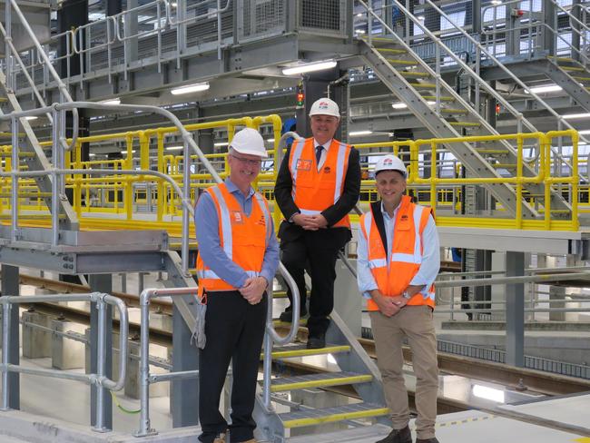 UGL Rail executive general manager Doug Moss (left), with Terrigal State Liberal MP Adam Crouch (centre) and Transport Minister Andrew Constance at the new rail maintenance facility at Kangy Angy. Picture: Richard Noone