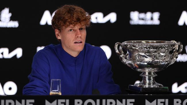 Italy's Jannik Sinner speaks during a press conference after his victory against Germany's Alexander Zverev during their men's singles final match on day fifteen of the Australian Open tennis tournament in Melbourne on January 27, 2025. (Photo by Adrian Dennis / AFP) / -- IMAGE RESTRICTED TO EDITORIAL USE - STRICTLY NO COMMERCIAL USE --