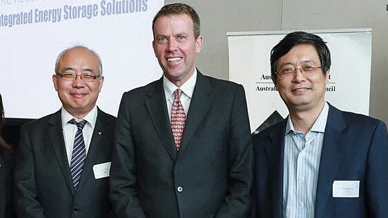 Education Minister Dan Tehan, centre, with Thousand Talents recipient Dong Zhaoyang, left, and Guoxiu Wang in a picture first posted online in February.