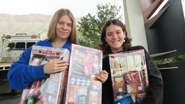Cushla Murphy and Adele Johnson with their Territory Day fireworks. Picture: Gera Kazakov