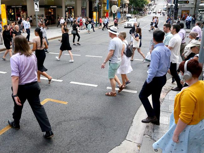 General pictures of crowds and office workers returning to the Brisbane CBD Brisbane Monday 14th March 2022 Picture David Clark