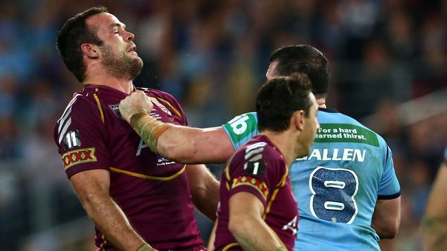 SYDNEY, AUSTRALIA - JUNE 05: Paul Gallen of the Blues punches Nate Myles of the Maroons during game one of the ARL State of Origin series between the New South Wales Blues and the Queensland Maroons at ANZ Stadium on June 5, 2013 in Sydney, Australia. (Photo by Mark Kolbe/Getty Images)