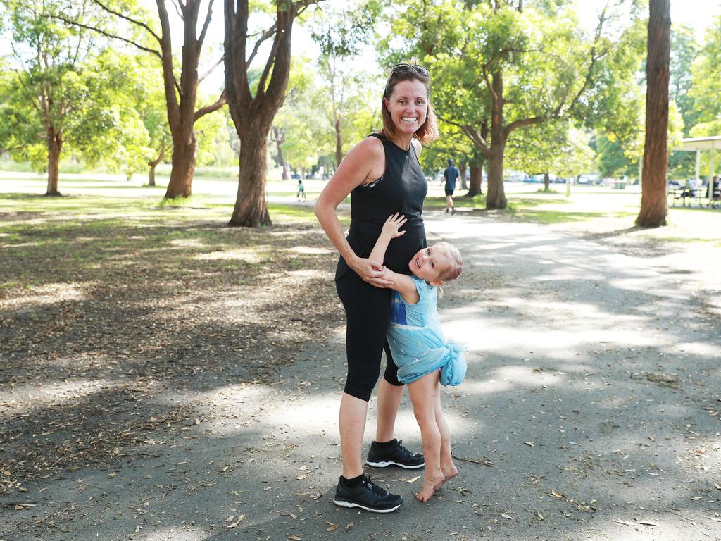 Pregnant mum Leigh Ashworth and her daughter Ivy at Centennial Park in Sydney. Picture: John Feder