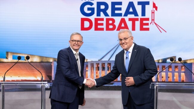 Australian Opposition Leader Anthony Albanese and Australian Prime Minister Scott Morrison shake hands at the start of the second leaders' debate of the 2022 federal election campaign at the Nine studio in Sydney. Photo: Alex Ellinghausen