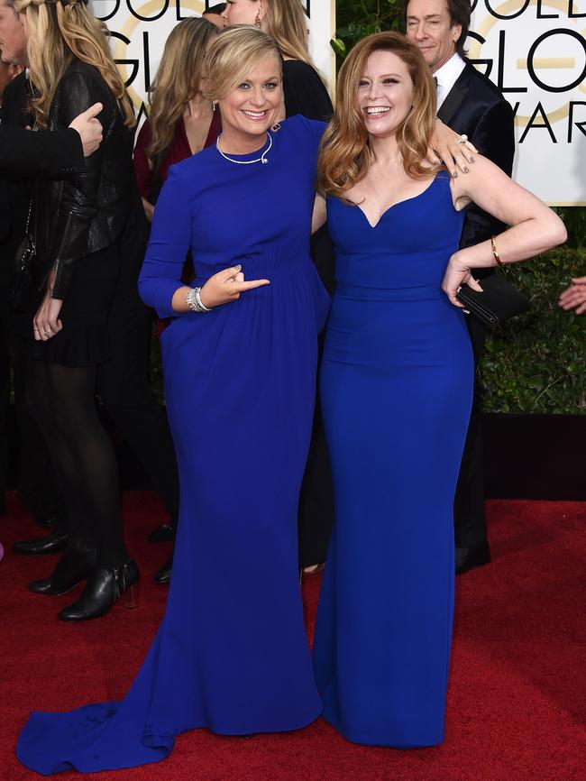 Amy Poehler, left, and Natasha Lyonne in a matching blue hue.