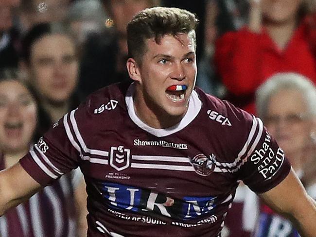 Manly's Reuben Garrick celebrates after scoring his third try during the Manly v Parramatta NRL match at Lottoland, Brookvale. Picture: Brett Costello