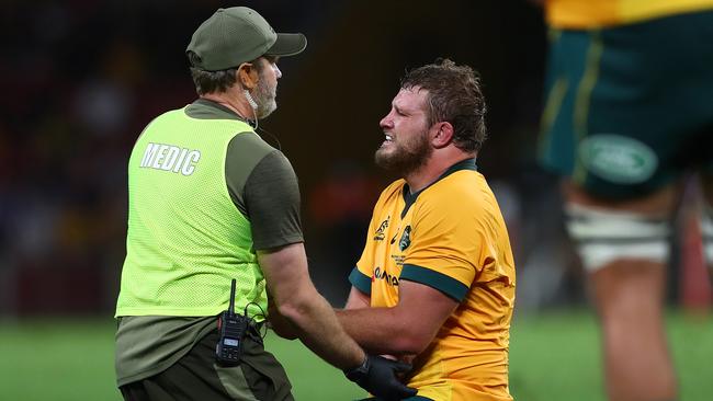 A medic attends to James Slipper. Picture: Jono Searle/Getty Images