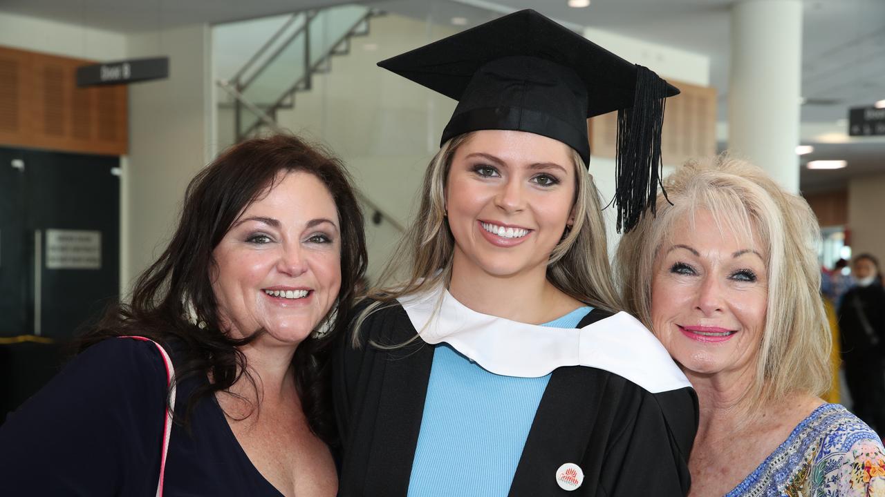 Griffith business school graduation at Gold Coast Convention Centre. Racheal Ryan, Meg Ryan, and Christina Van Haeften. Picture Glenn Hampson