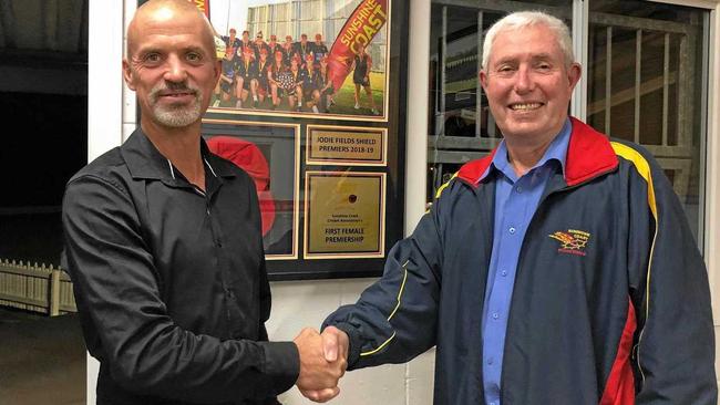 Sunshine Coast Cricket Association re elected President JohnHope thanks Pat Drew for his 30 years of service on the management committee. Picture: Contributed