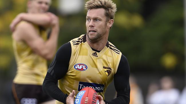 Hawk Sam Mitchell put through his paces at training. Picture: Andy Brownbill