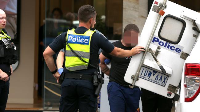 Police arrest a man in Malop Street in front of Myer. Picture: Mike Dugdale