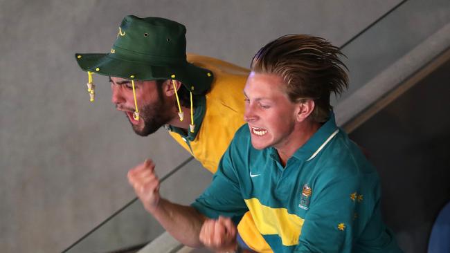 Spectators at the back of Margaret Court Arena who were hyping up the crowd in favour of Kokkinakis. Picture: Kelly Defina/Getty Images