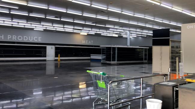 Empty ... a new Woolworths at Bryants Rd and Coles and Woolworths at the Hyperdome were taking custom from this 24-hour supermarket which has closed at Loganholme.