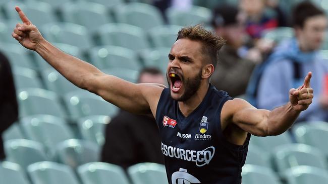 South Adelaide’s Rigby Barnes celebrates kicking a goal. Photo Tom Huntley