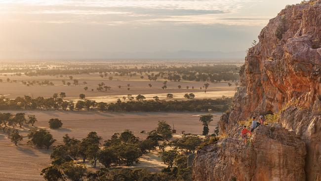 The town of Natimuk faces catastrophe if Mount Arapiles climbing ban goes forward. From right, Madi Russell, Ben Shepherd and Melissa Edwards after climbing Muldoon. Picture: Nadir Kinani