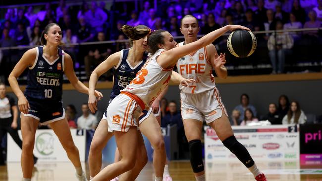 GEELONG, AUSTRALIA - OCTOBER 30: Abbey Ellis of the Townsville Fire competes for the ball during the round one WNBL match between Geelong United and Townsville Fire at The Geelong Arena, on October 30, 2024, in Geelong, Australia. (Photo by Kelly Defina/Getty Images)