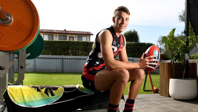 West Adelaide AFL draft prospect Riley Thilthorpe pictured in his backyard with dog Axel. Picture: Tricia Watkinson