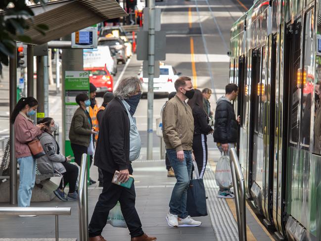 Looking for people wearing masks in public and on public transport in the City.  Bourke Street Mall. Picture: Tony Gough