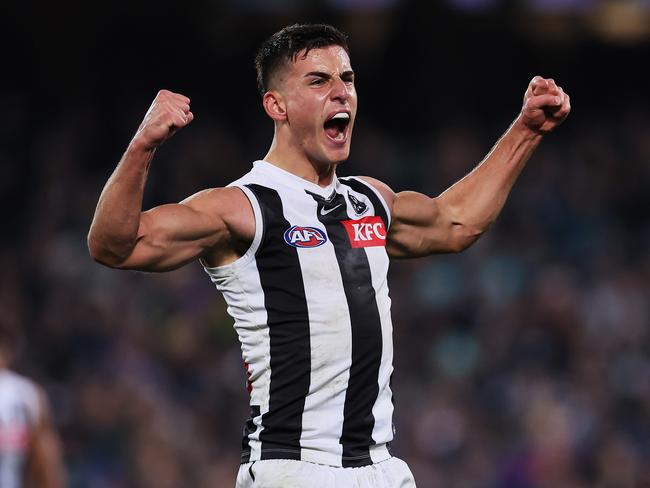 ADELAIDE, AUSTRALIA - JULY 22: Nick Daicos of the Magpies celebrates a goal during the 2023 AFL Round 19 match between the Port Adelaide Power and the Collingwood Magpies at Adelaide Oval on July 22, 2023 in Adelaide, Australia. (Photo by James Elsby/AFL Photos via Getty Images)